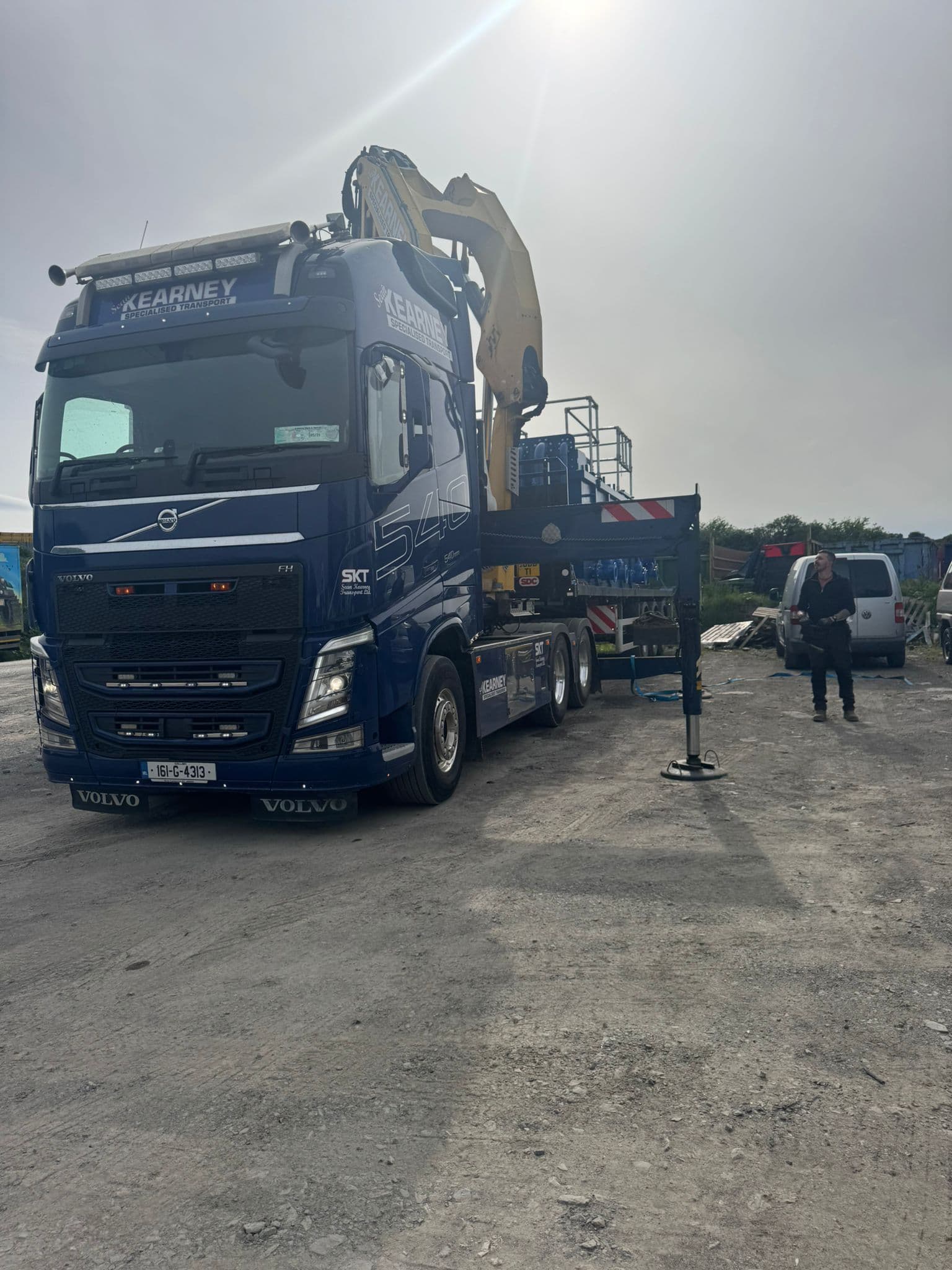Sean Kearney Transport specialized vehicle transport with yellow excavator
